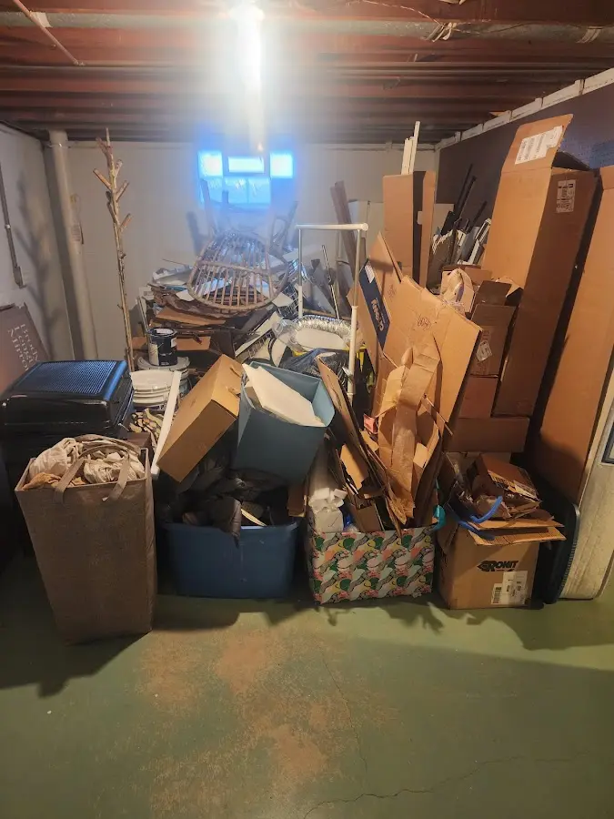 Roll-off dumpster container at job site for 6 Yard Dumpster Rental in Delta